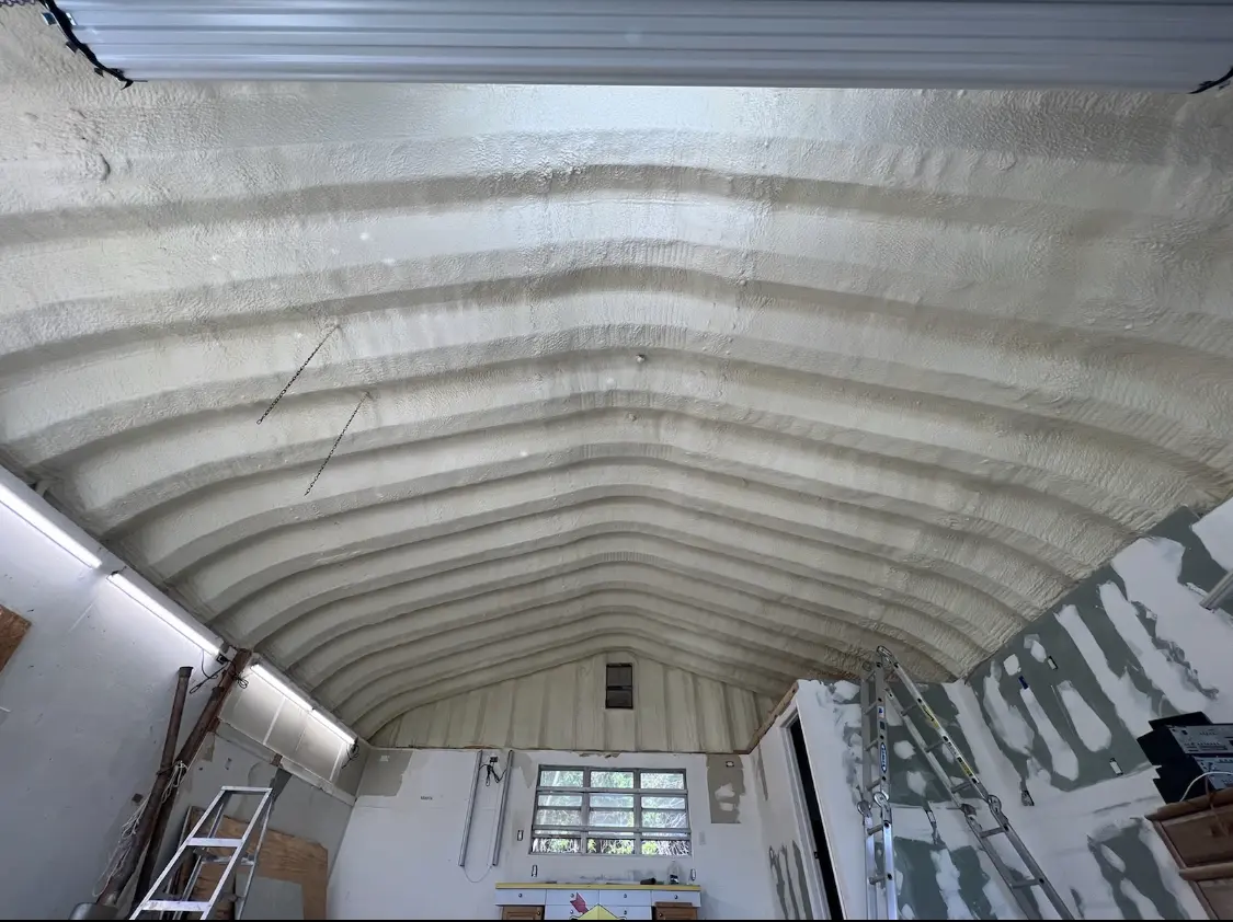 Spray polyurethane foam applied to the underside of a metal roof deck in Marina del Rey